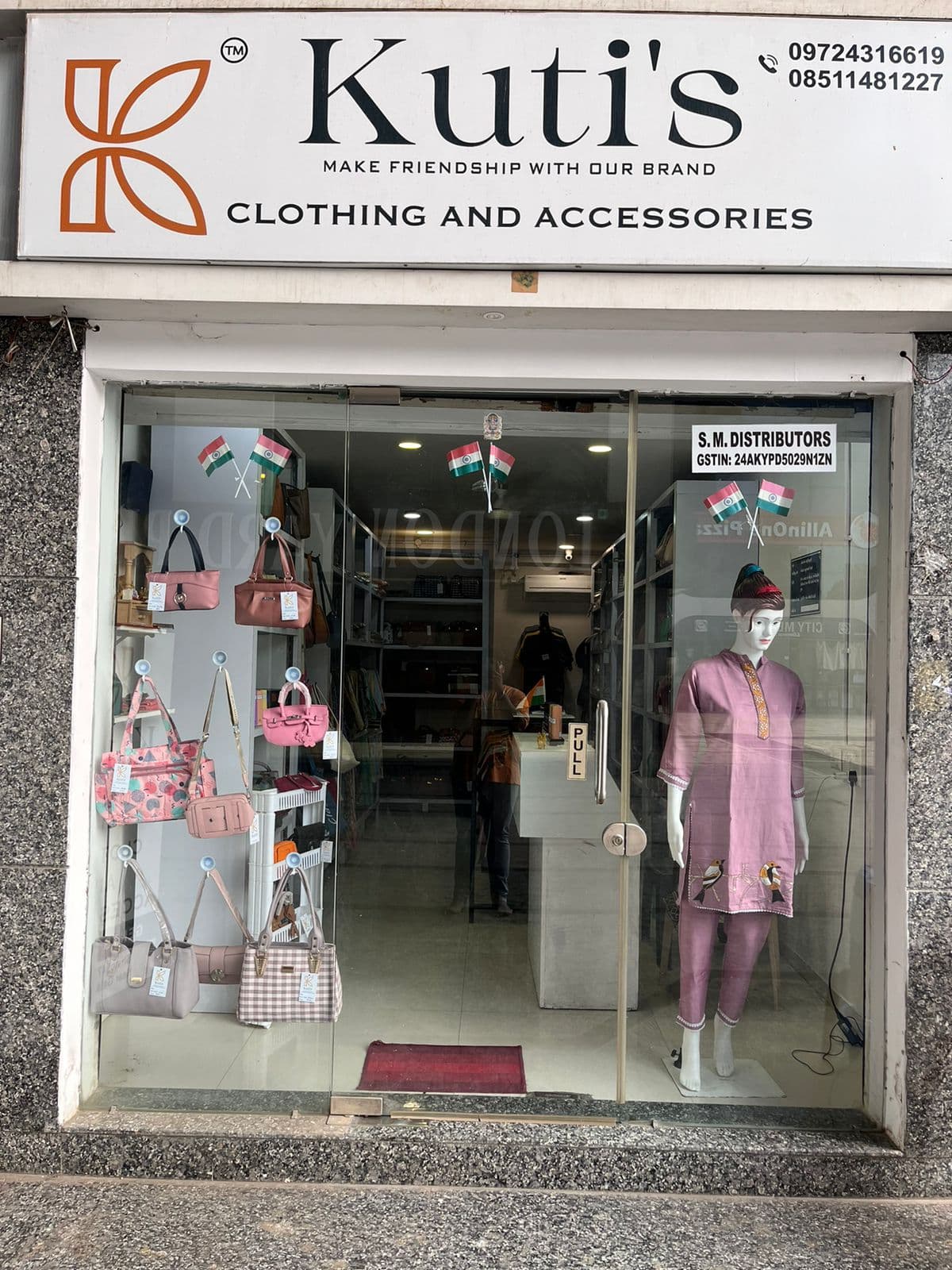 Kuti's Ladies Clothing and Purse