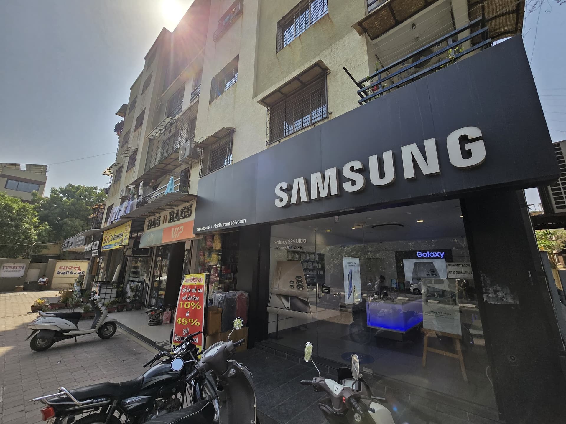 Samsung Experience Store - Madhuram Telecom - Adajan